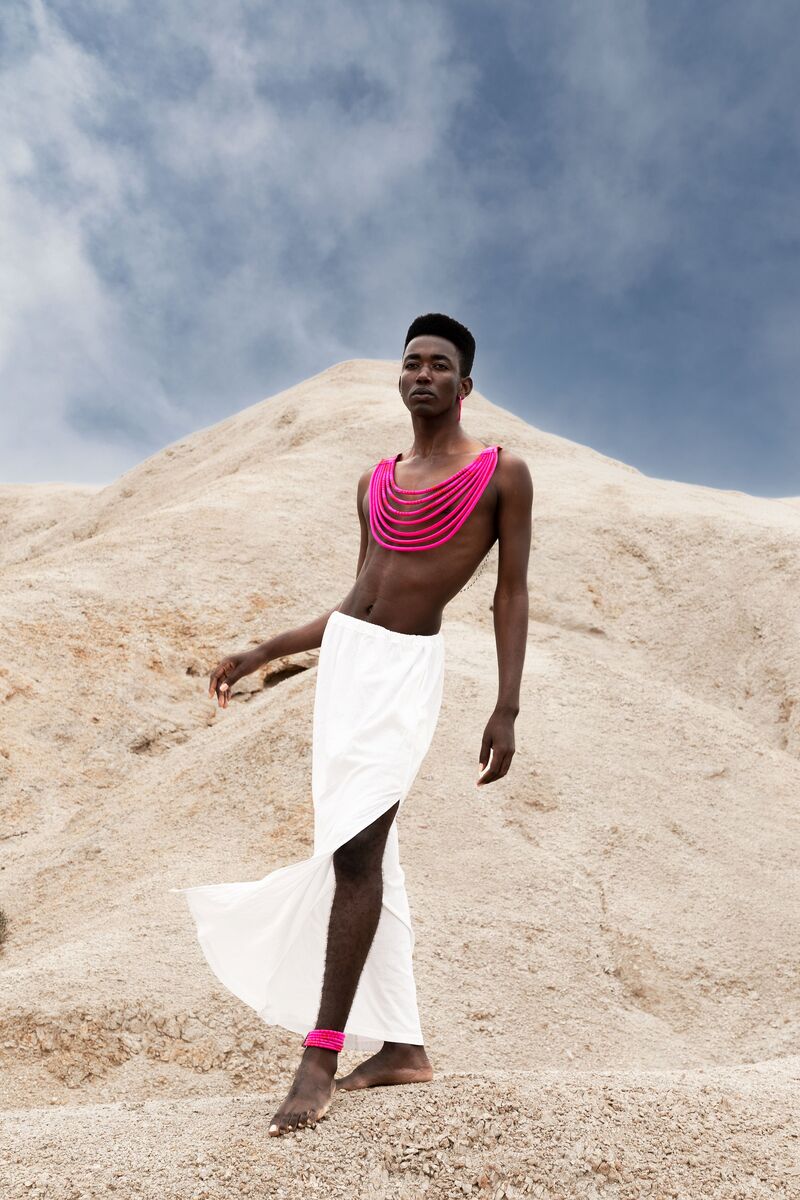 Dorob editorial — garments at salt-pan horizon