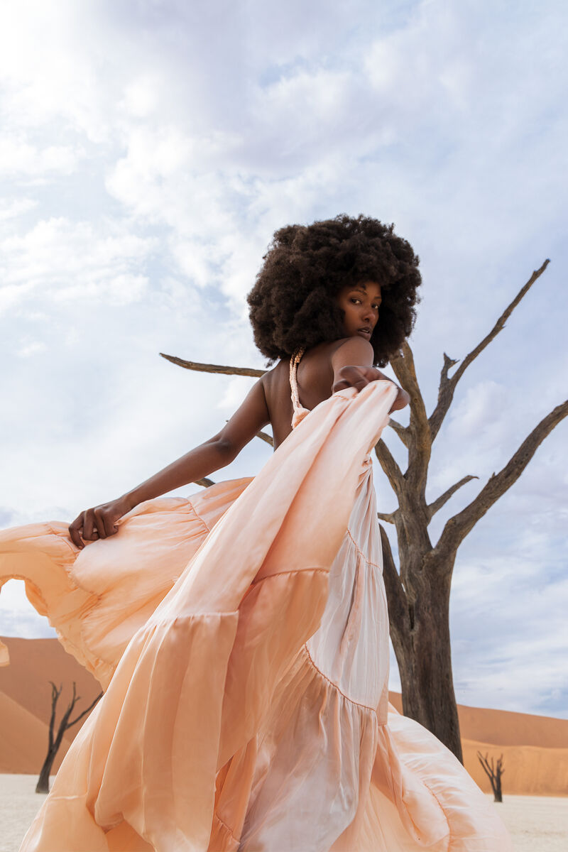 Erika Peña — close on hands and pieces, Deadvlei