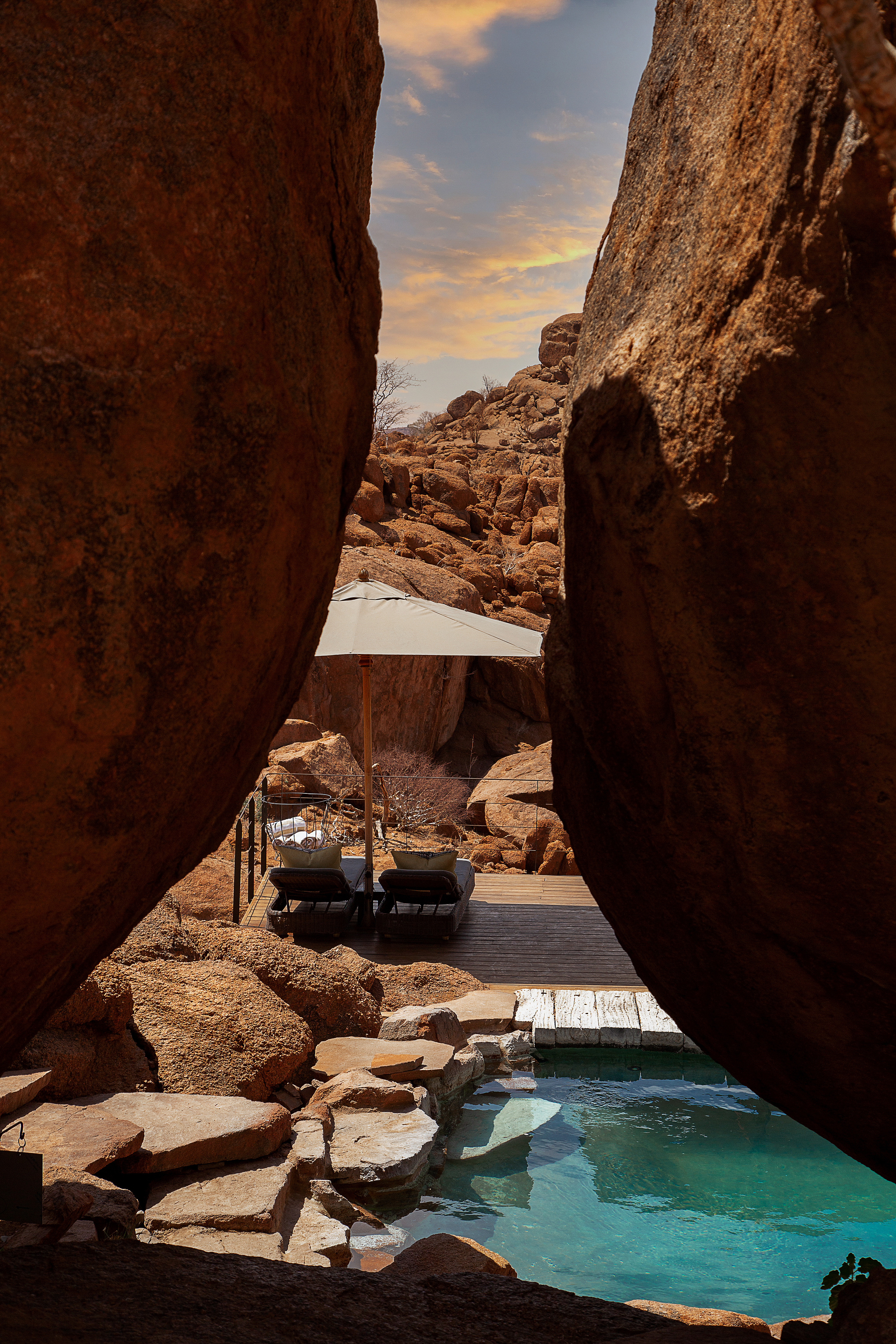 Mountain lodge room interior, panoramic Namib view
