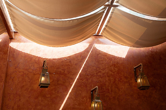 Riad interior, brass detail, layered fabric